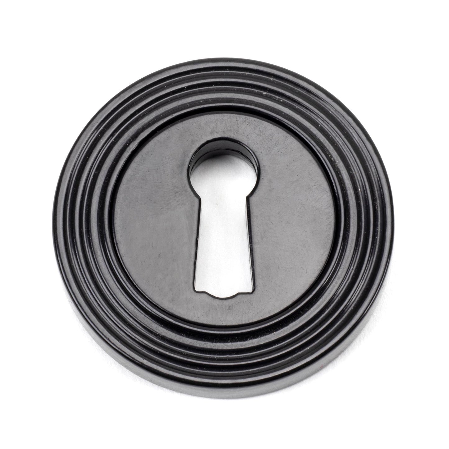 From The Anvil Round Escutcheon