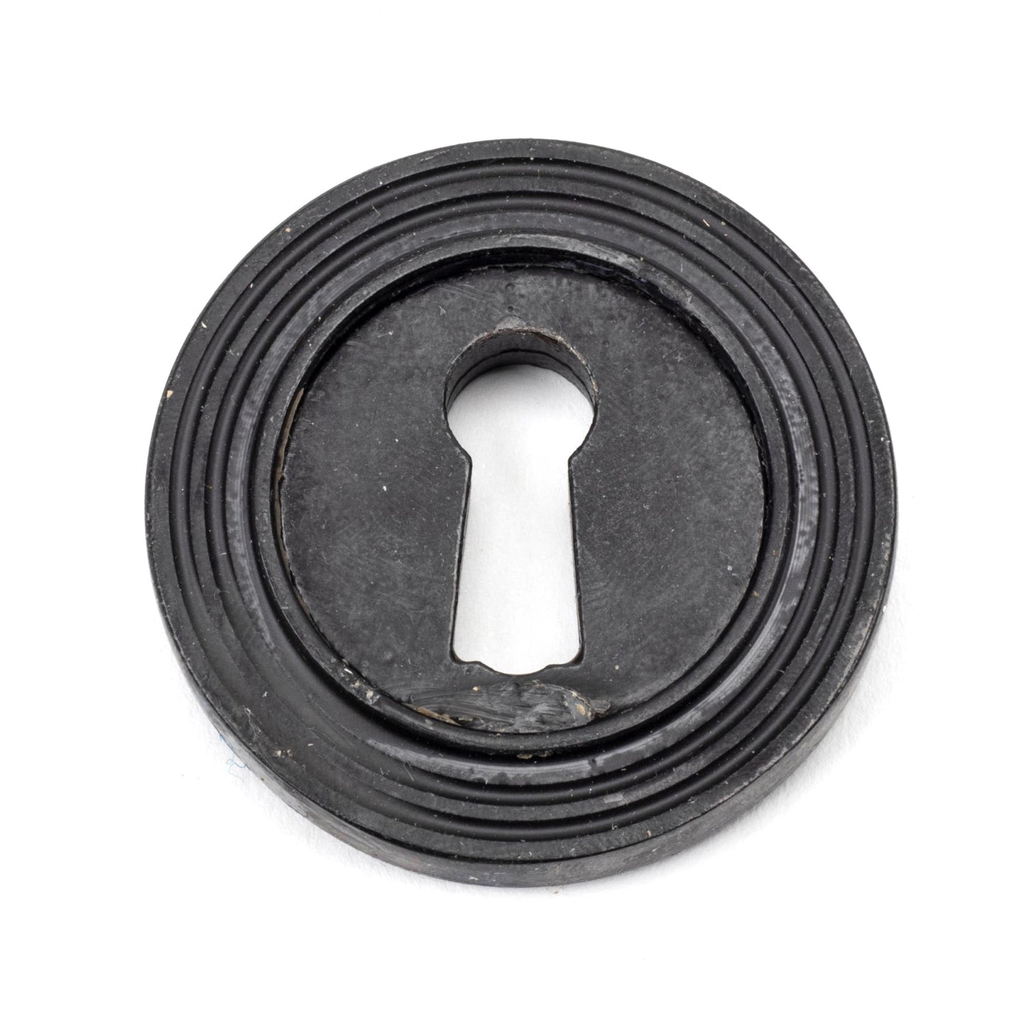 From The Anvil Round Escutcheon