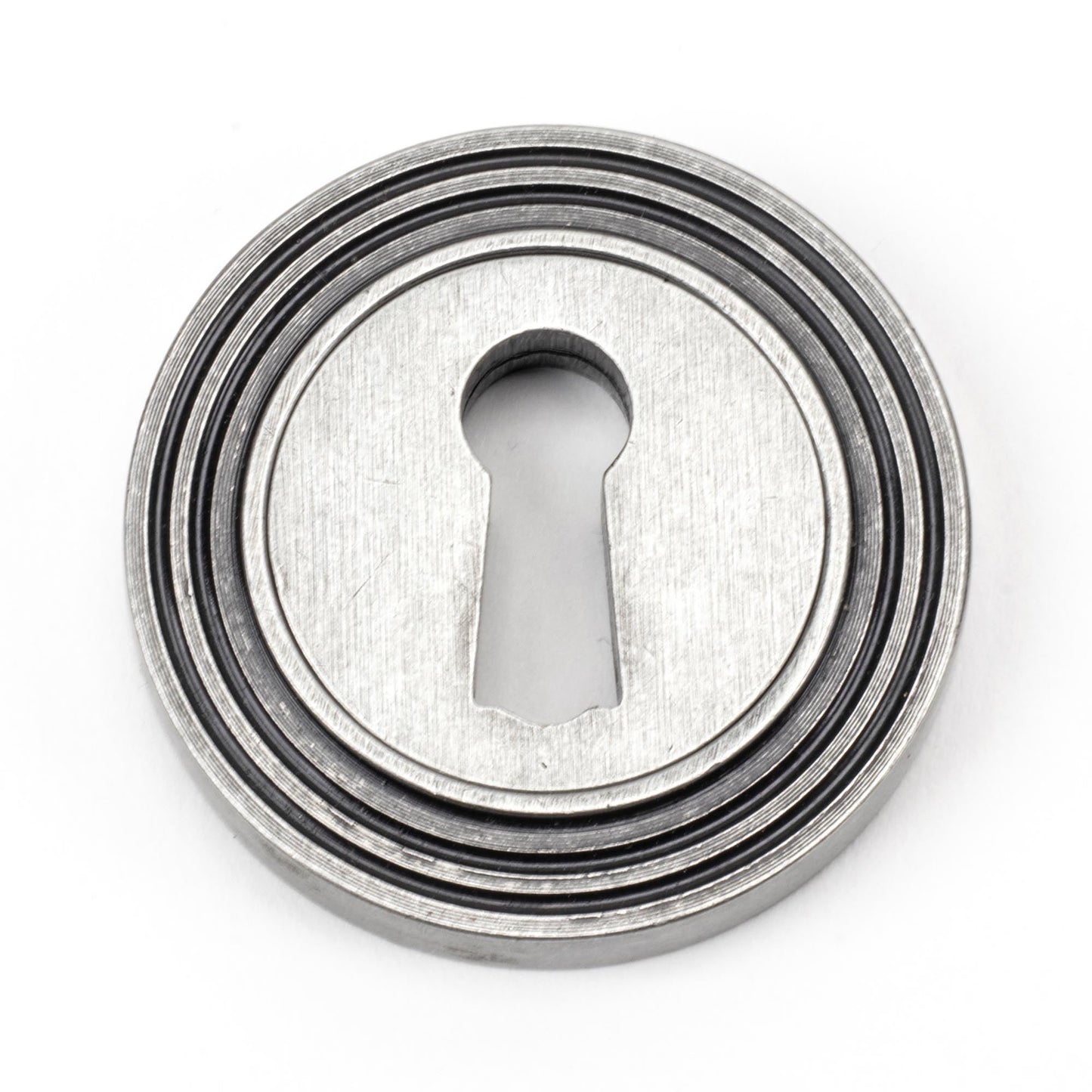 From The Anvil Round Escutcheon