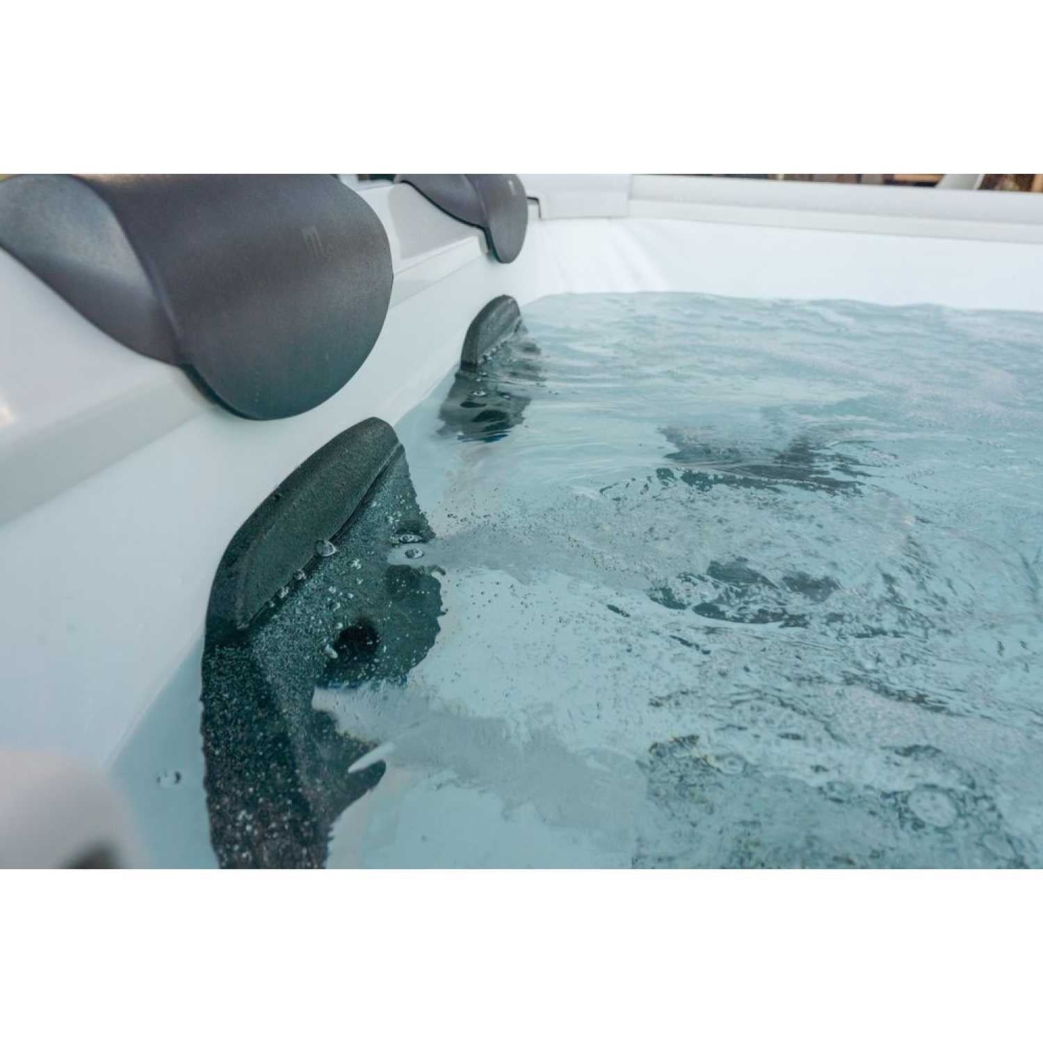 Grey portable hard frame hot tub interior with built-in black headrests and bubbling water. - Home Interior Shop - MSpa Oslo 4-6 Person Portable Hard Frame Hot Tub - Grey