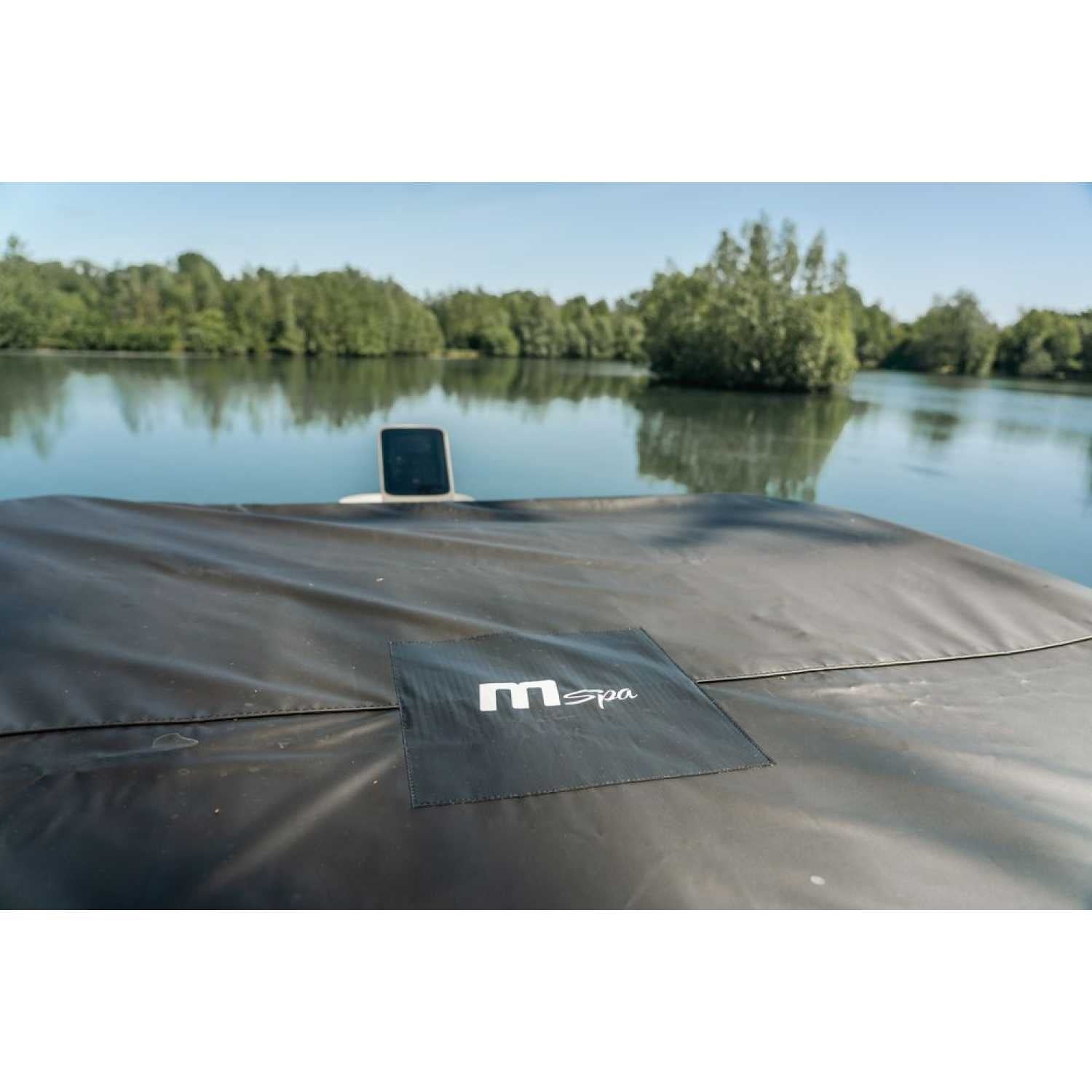 Grey portable hard frame hot tub cover with MSpa logo, lake and trees in background. - Home Interior Shop - MSpa Oslo 4-6 Person Portable Hard Frame Hot Tub - Grey