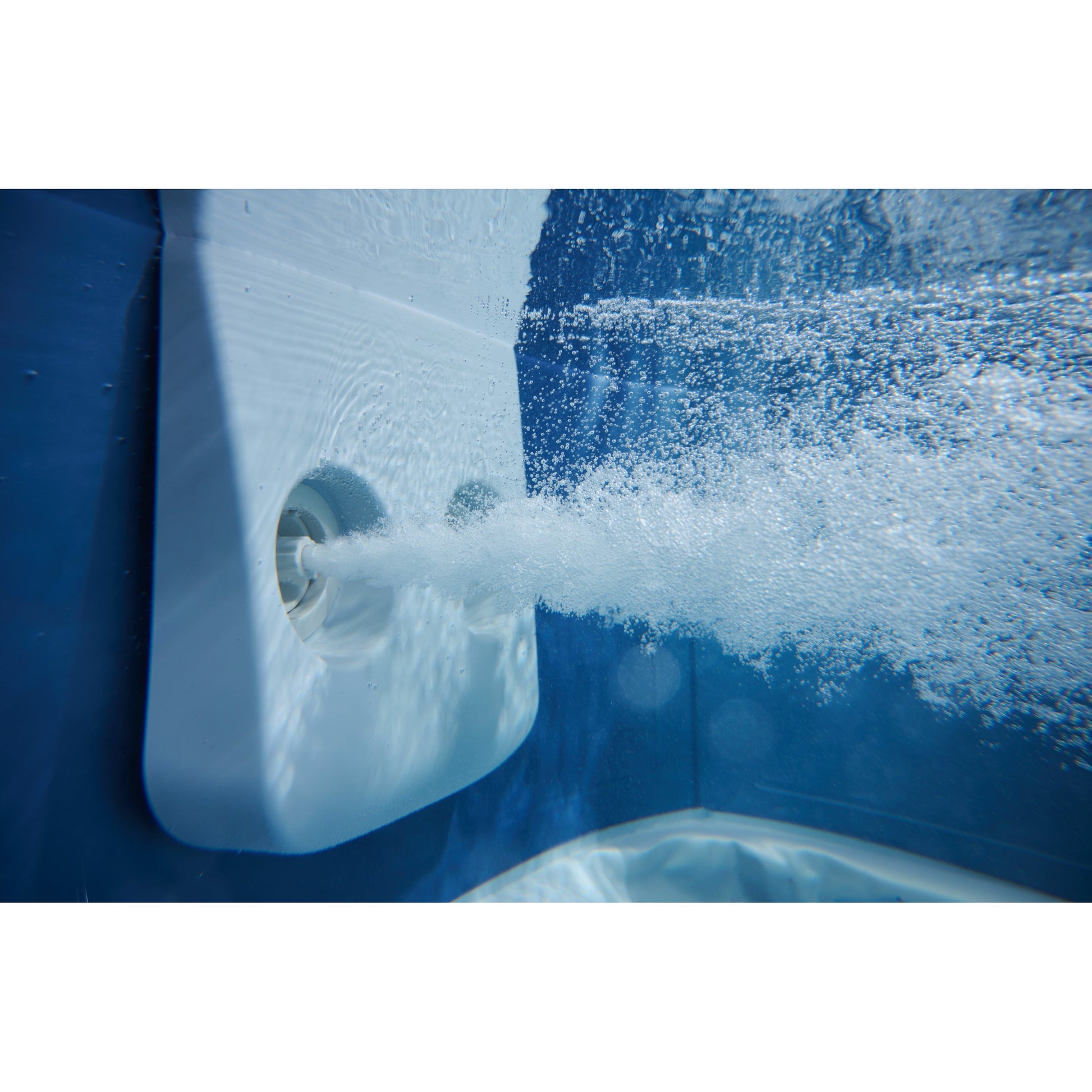 Blue portable hard frame hot tub jet emitting strong water spray inside textured blue interior wall. - Home Interior Shop - MSpa Oslo 4-6 Person Portable Hard Frame Hot Tub - Sapphire