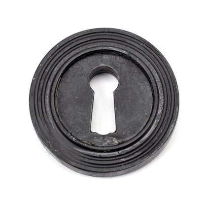 From The Anvil Round Escutcheon