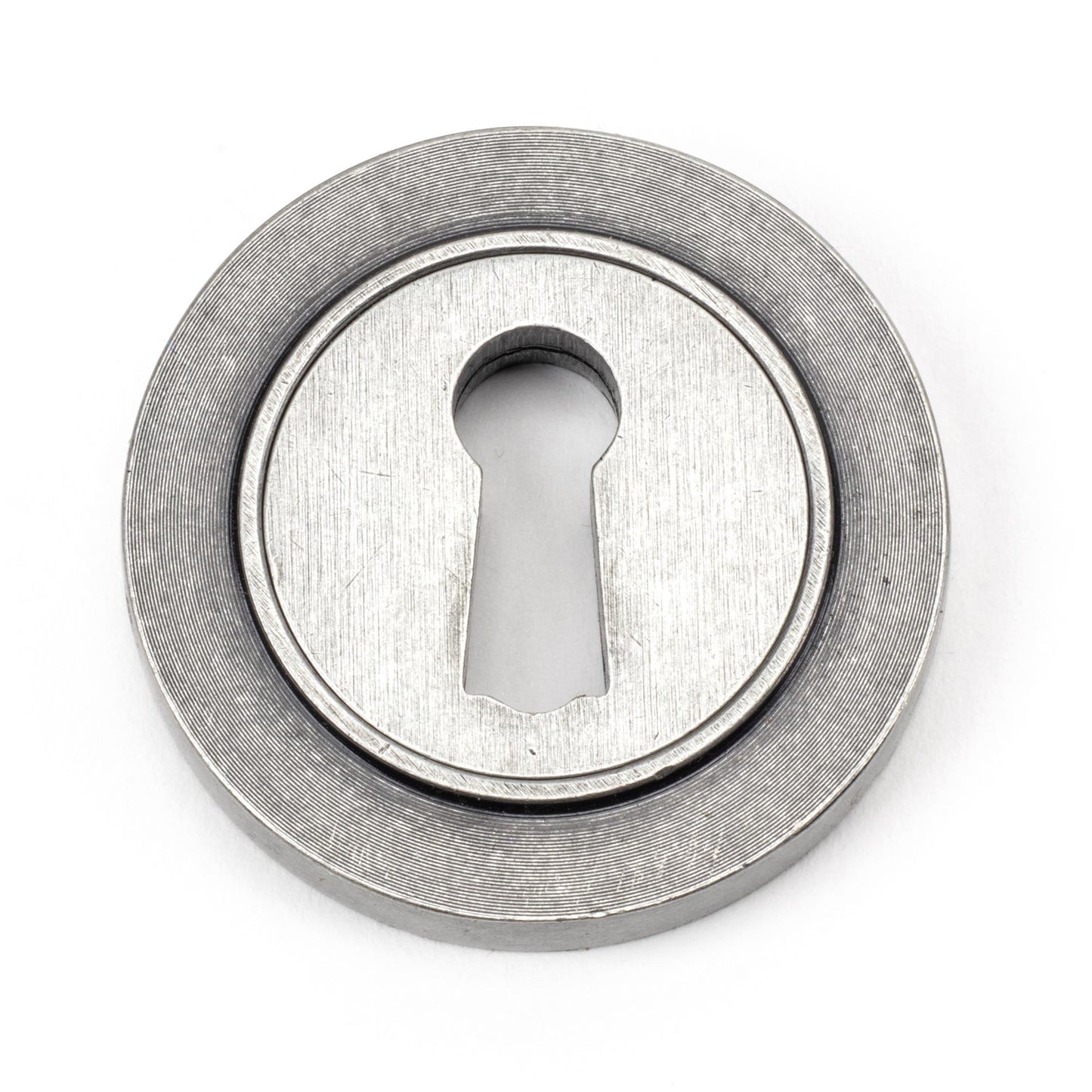 From The Anvil Round Escutcheon