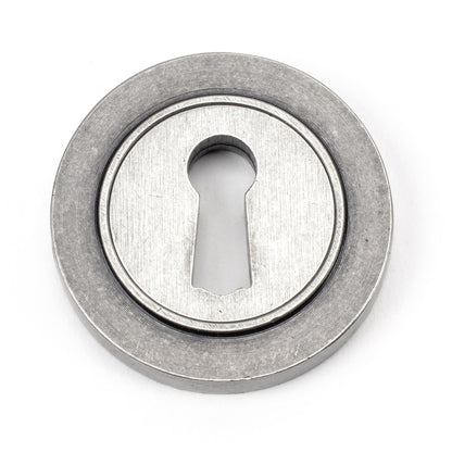 From The Anvil Round Escutcheon