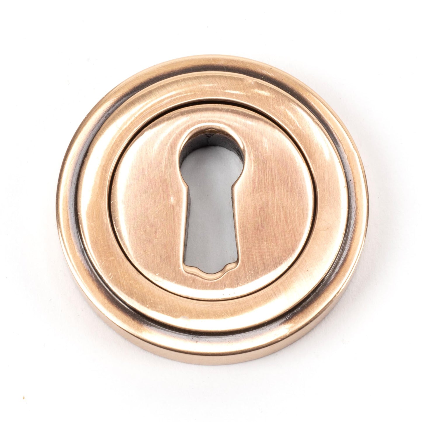 From The Anvil Round Escutcheon
