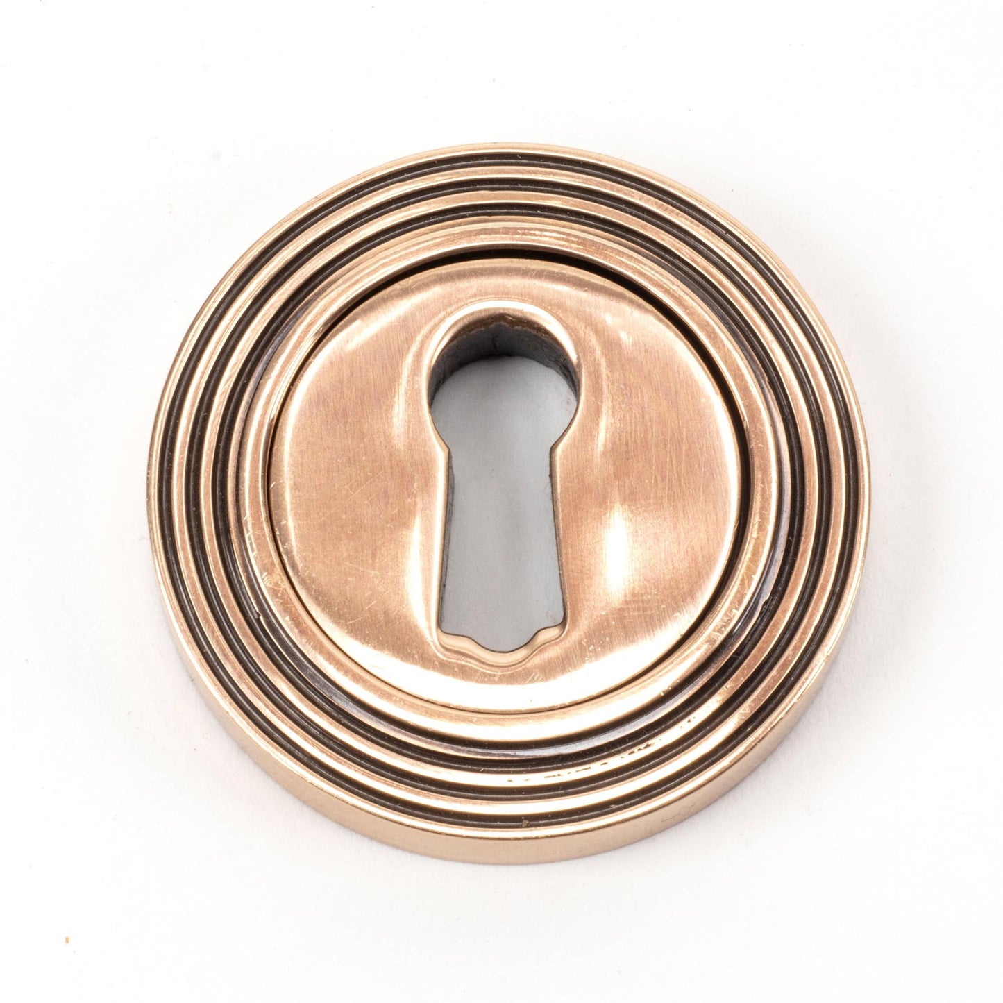 From The Anvil Round Escutcheon
