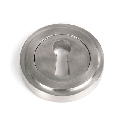 From The Anvil Round Escutcheon