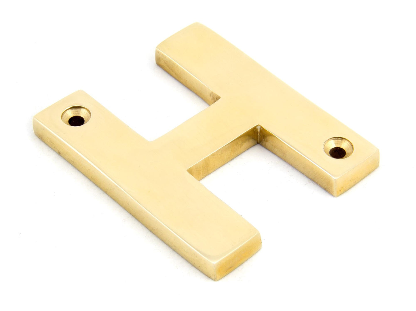 From The Anvil Polished Brass Letter